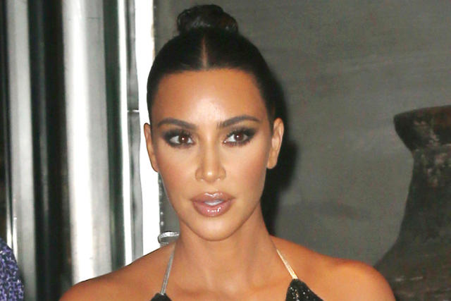 Kim Kardashian Models Sheer Tights & a Classic Bralette to Introduce Skims  Hosiery