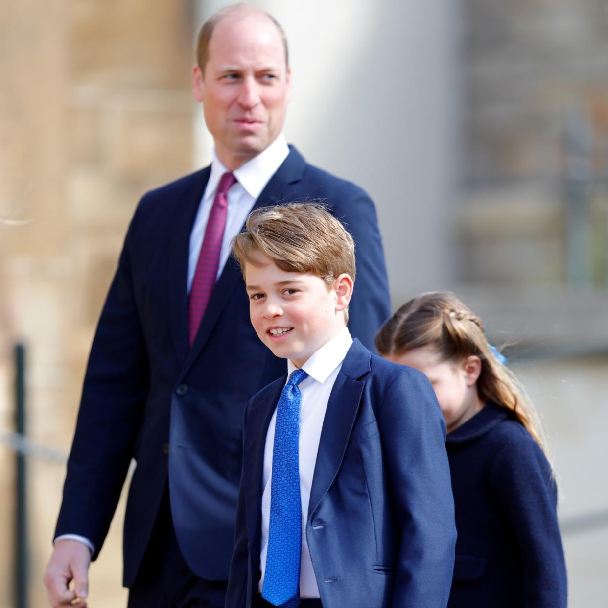  Prince William and Prince George at an event. 