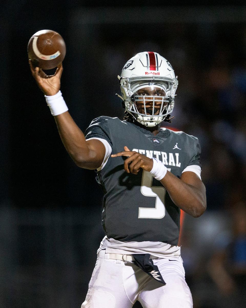 Palm Beach Central quarterback Ahmad Haston throws the ball during game against Wellington on October 28, 2022.