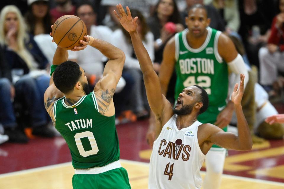 Celtics forward Jayson Tatum shoots over Cavaliers forward Evan Mobley in the fourth quarter of Game 4 of the Eastern Conference semifinals, May 13, 2024, in Cleveland.