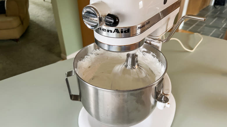 Stiff egg whites whipping in stand mixer