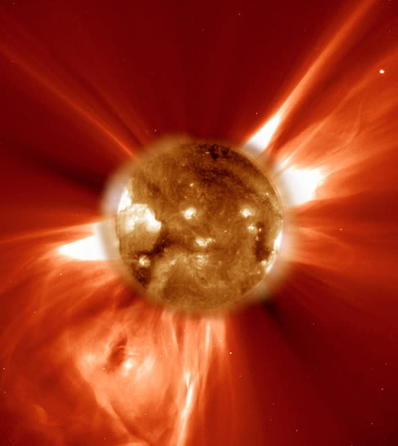 A snapshot of a coronal mass ejection firing off the surface of the sun, captured by NASA's SOHO spacecraft. This image shows the sun in ultraviolet light, while the field of view extends over 2 million kilometers, or 1.243 million miles, from