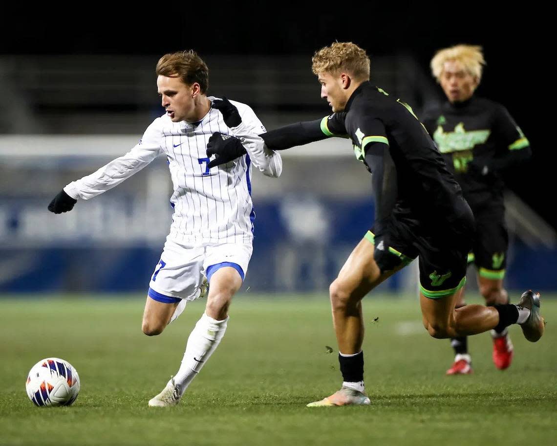 Nick Gutmann (7) added two assists Sunday night to his nation-leading season total as Kentucky eliminated South Florida from the NCAA Tournament.