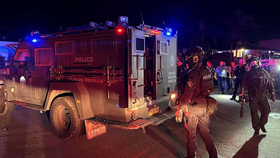 A police tactical team works at the scene following a stabbing at Christ The Good Shepherd Church in the suburb of Wakeley in Sydney, Australia, on Monday.