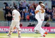 Cricket - England v Australia - Investec Ashes Test Series Third Test - Edgbaston - 30/7/15 England's Steven Finn celebrates the wicket of Australia's Steven Smith with team mates Action Images via Reuters / Carl Recine Livepic