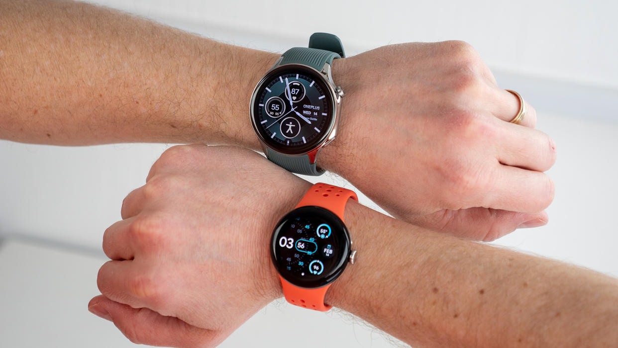  The OnePlus Watch 2 and Pixel Watch 2 worn on left and right wrists. 