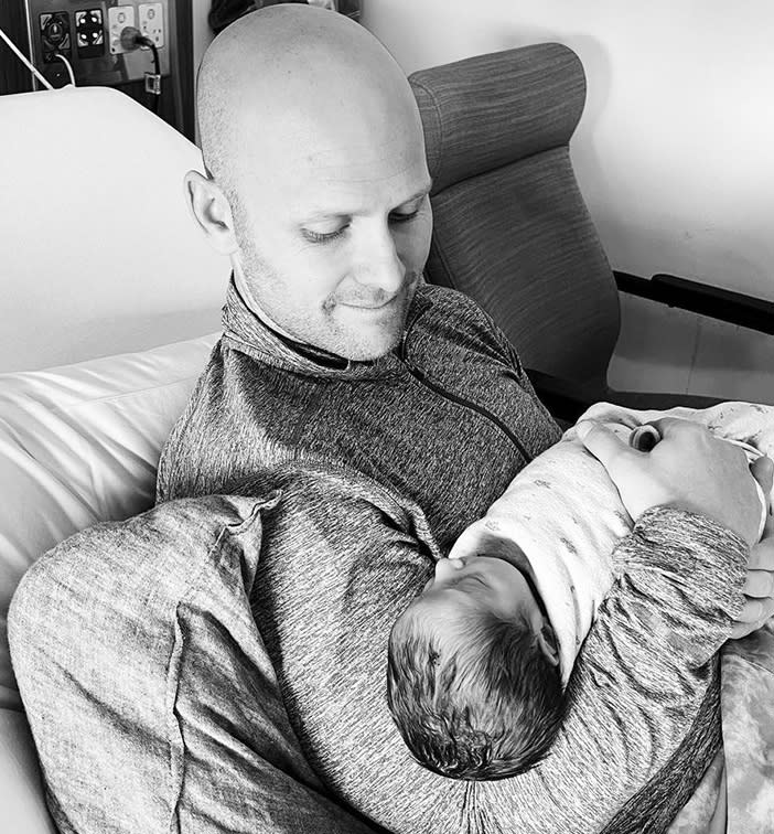 Gary Ablett pictured holding the couple's third child Ezra. Image: Gary Ablett's Instagram