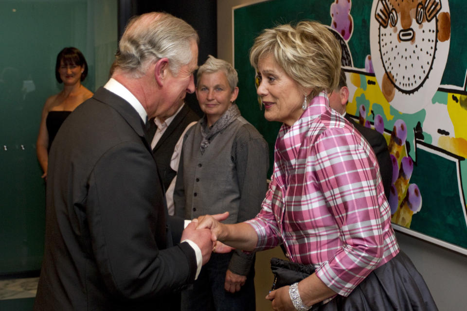 Britain's Prince Charles, left, meets New Zealand's Maori soprano, Kiri Te Kanawa at a Diamond Jubilee Trust Reception and Dinner in Auckland, New Zealand, Monday, Nov. 12, 2012. (AP Photo/SNPA, David Rowland) NEW ZEALAND OUT