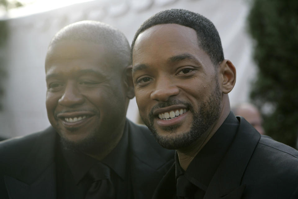 Will Smith, right, and Forest Whitaker arrive at the 13th Annual Screen Actors Guild Awards on Sunday, Jan. 28, 2007, in Los Angeles. (AP Photo/Chris Carlson)