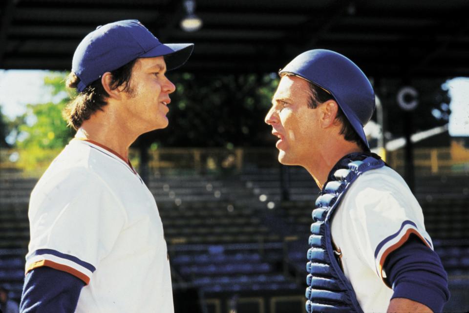 Eppy Calvin "Nuke" LaLoosh (Tim Robbins, left) and Crash Davis (Kevin Costner) exchange heated words on the mound in the 1988 movie "Bull Durham."