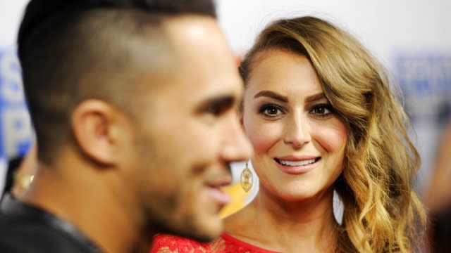 Alexa PenaVega, right, and her husband Carlos PenaVega are pictured.