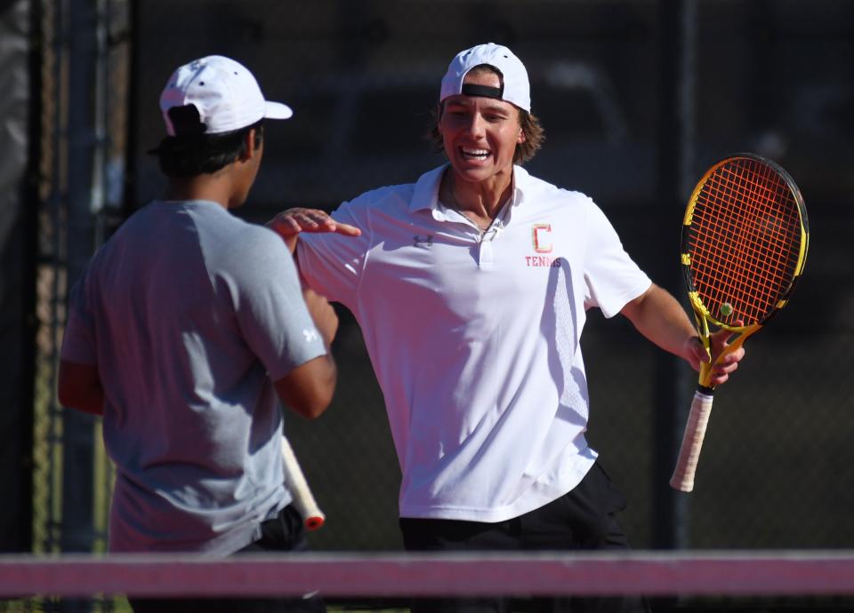 Coronado's Thomas Mann, right, and Daniel Warraich celebrate a point in the Region I-5A tennis tournament Thursday, May 9, 2024, at McLeod Tennis Center.