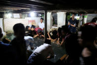 <p>Students perform ablutions before attending night prayers during the holy month of Ramadan at Lirboyo Islamic boarding school in Kediri, Indonesia, May 19, 2018. (Photo: Beawiharta/Reuters) </p>