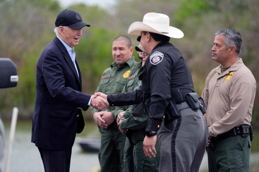 FILE - President Joe Biden talks with the U.S. Border Patrol and local officials as he looks over the southern border, Feb. 29, 2024, in Brownsville, Texas, along the Rio Grande. Democrats are trying to outflank Republicans and convince voters they can address problems at the U.S. border with Mexico as immigration likely becomes a major issue in elections that will decide control of Congress. (AP Photo/Evan Vucci, File)