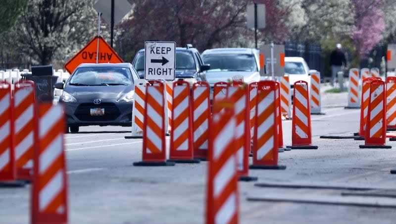 Vehicles navigate a construction zone in South Jordan on April 8. Expect to see construction workers and orange cones dotting Utah's roads this summer as the Utah Department of Transportation revs up 209 projects.