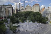 FILE - In this July 14, 2020, file photo pedestrians pass Union Square in New York. The surge in the nation’s urban population could give these urban centers greater influence in reshaping the balance of power in Washington as congressional redistricting gets under way. New York in particular is giving Democrats hope. The most populous city in the United States added some 629,000 new residents, more people than live in Wyoming. (AP Photo/Frank Franklin II, File)