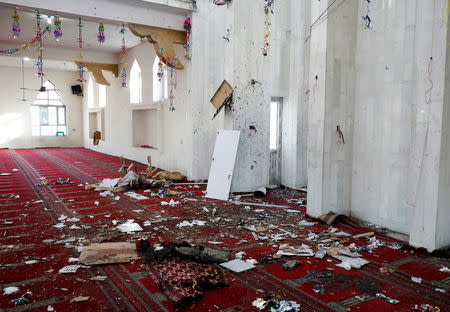 Hats are seen inside a mosque after a blast in Kabul, Afghanistan May 24, 2019. REUTERS/Omar Sobhani