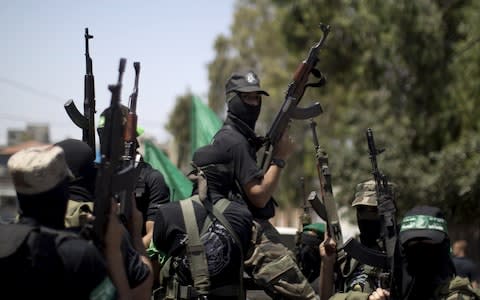 The future of Hamas' armed wing is a potential major stumbling block in the reconciliation deal - Credit: AFP PHOTO / MAHMUD HAMS