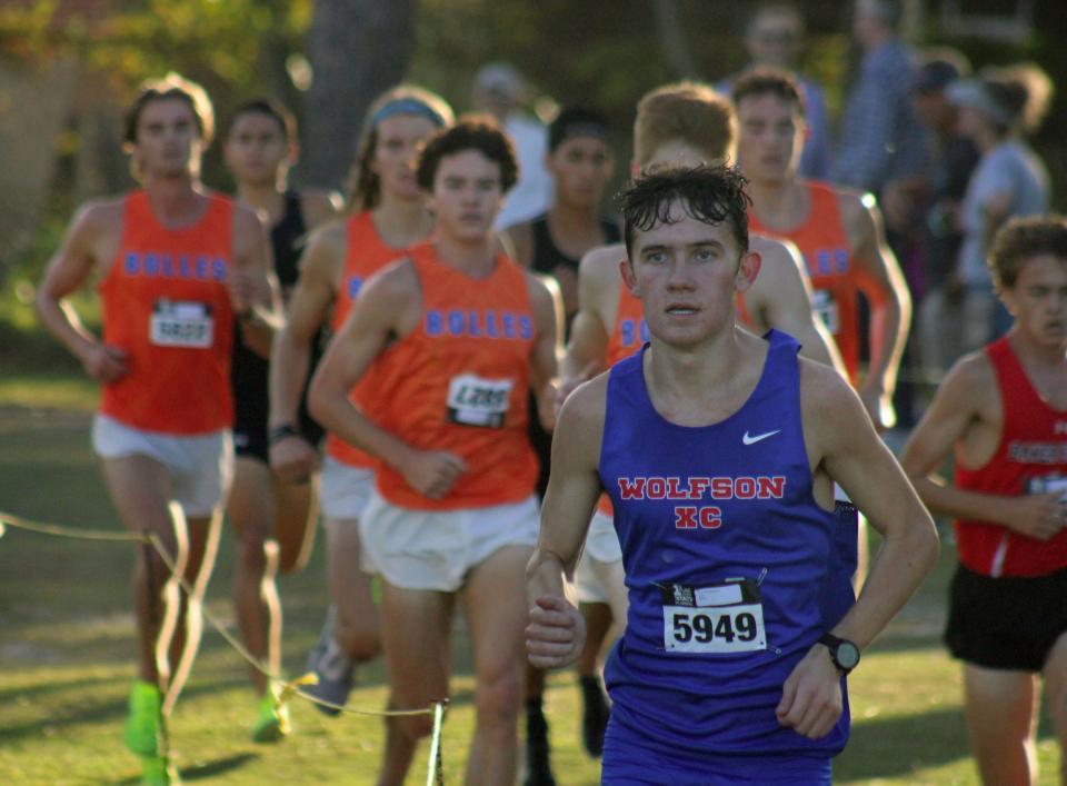 Wolfson's Andrew Marello (5949) and a host of Bolles runners compete in the District 2-2A meet on Oct. 30.