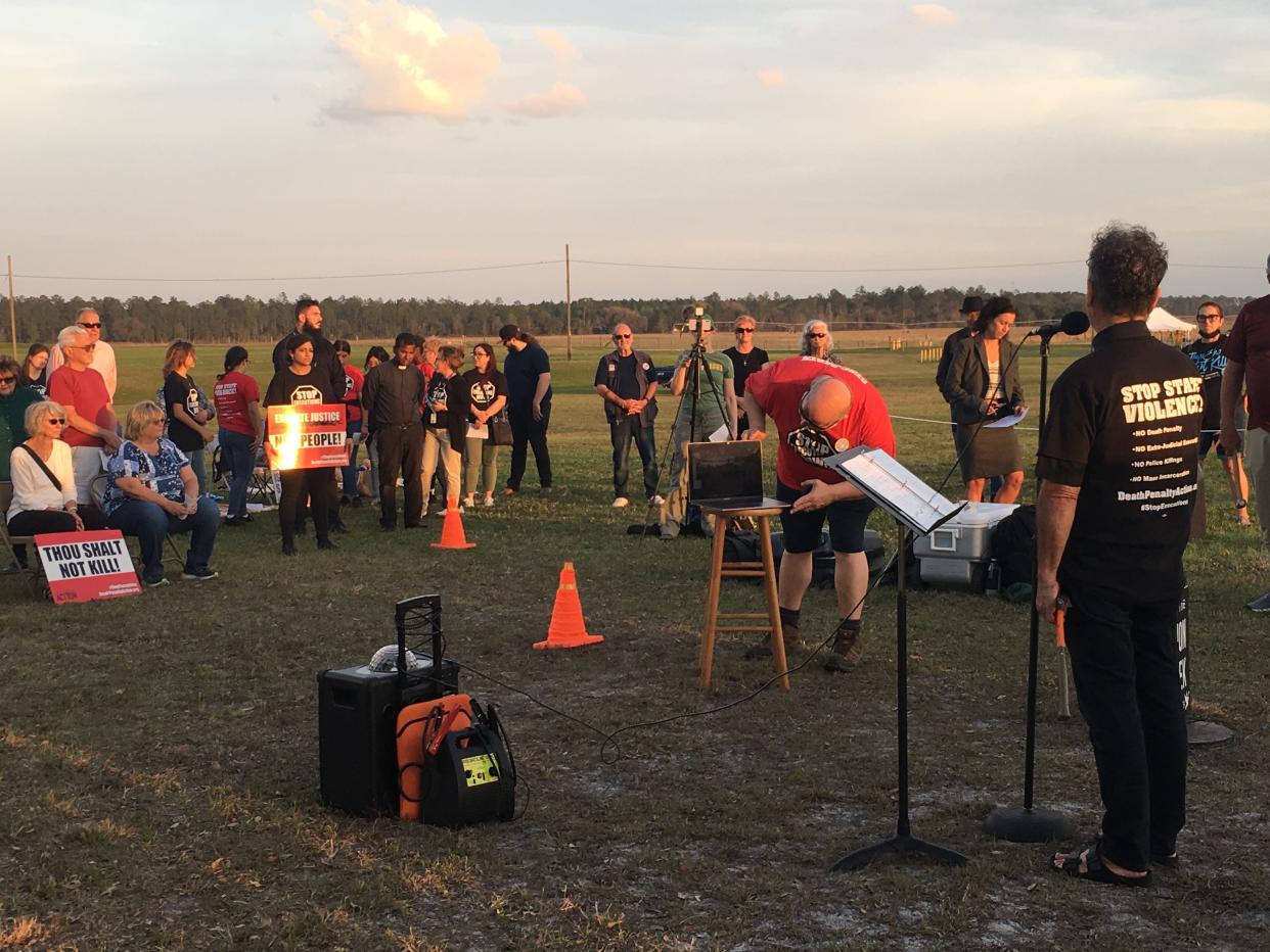 Attendees hosted a vigil for Donald Dillbeck, the first Florida inmate executed by the state since 2019, outside the Florida State Prison in Raiford.