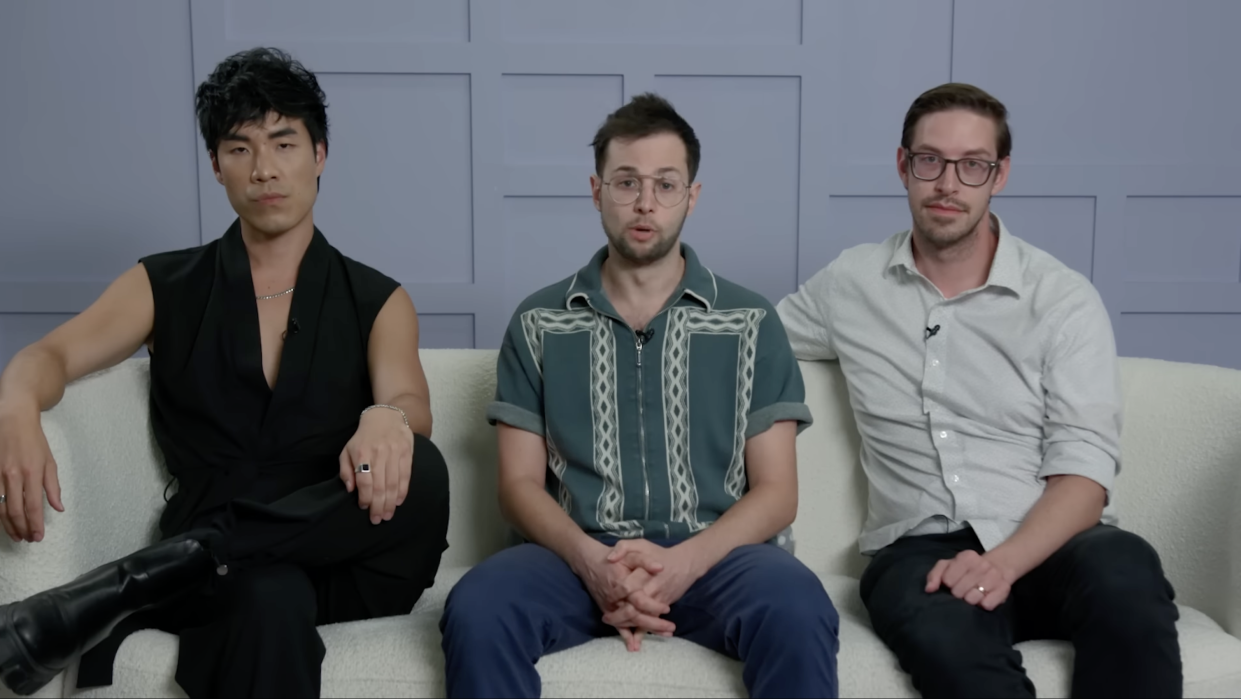 The Try Guys sitting on a couch looking at the camera