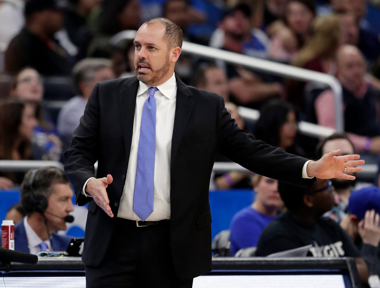 Orlando Magic head coach Frank Vogel directs his players against the Washington Wizards during the first half of an NBA basketball game, Wednesday, April 11, 2018, in Orlando, Fla. (AP Photo/John Raoux)