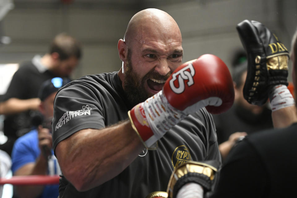 Fighting fit: Tyson Fury works out in front of Los Angeles ahead of the big night