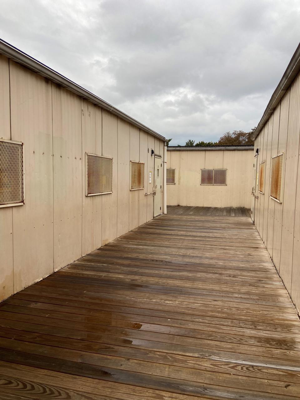 Because of limited capacity for current students, Paterson's School 3 holds some classes in temporary trailers outside.