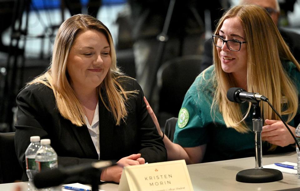 Kristen Morin, left, discusses how a MASSGrant Plus scholarship made it possible for her to study business administration at MassBay Community College. At right is MassBay nursing student Amanda Larosee.