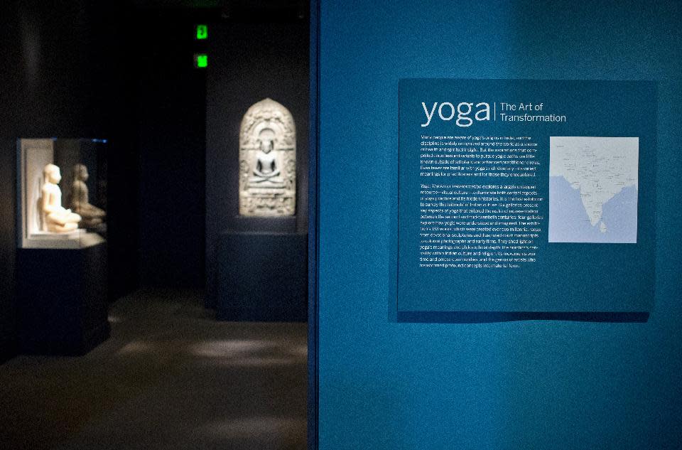 A view during the press preview of Yoga: The Art of Transformation at the Smithsonian's Sackler Gallery in Washington, Tuesday, Oct. 22, 2013. The Smithsonian Institution has organized what curators believe is the first exhibition about the visual history and art of yoga. The exhibition includes Indian sculpture, manuscripts and paintings, as well as posters, illustrations, photographs and films to showcase the history of yoga over 2,000 years. (AP Photo/ Evan Vucci)