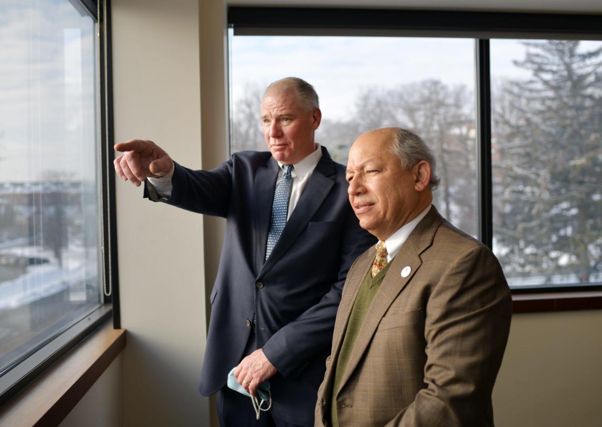 UMass Memorial Health executive vice president and CFO Sergio Melgar -- right, pictured CEO Eric Dickson -- says the hospital has been unable to bill for most medical services since Feb. 21.