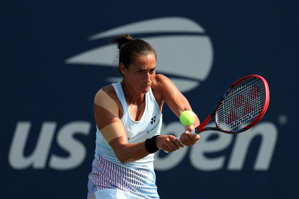 Caroline Garcia returns against Renata Zarazua during their first round match at the U.S. Open.