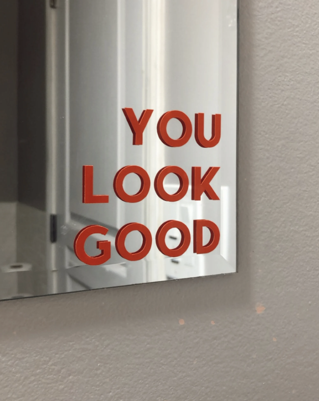 You Look Good Square Mirror Decal in red on mirror (photo via Etsy)