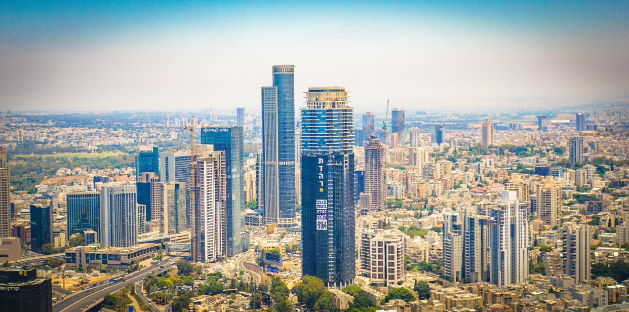 Photos taken from the top of Azrieli Center Circular Tower, once the tallest building in Israel, at 53 stories.