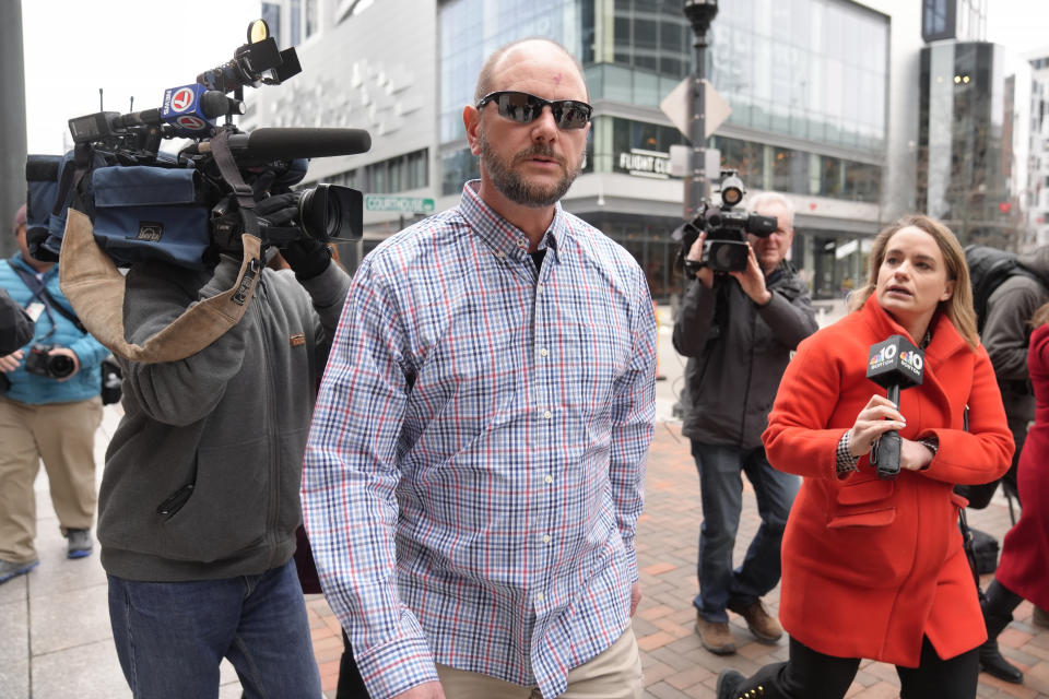 Jack Michael Teixeira, center, father of Massachusetts Air National Guardsman Jack Teixeira, arrives at federal court, Monday, March 4, 2024, in Boston. Jack Teixeira is accused of leaking highly classified military documents about Russia's war in Ukraine and other national security secrets. (AP Photo/Steven Senne)