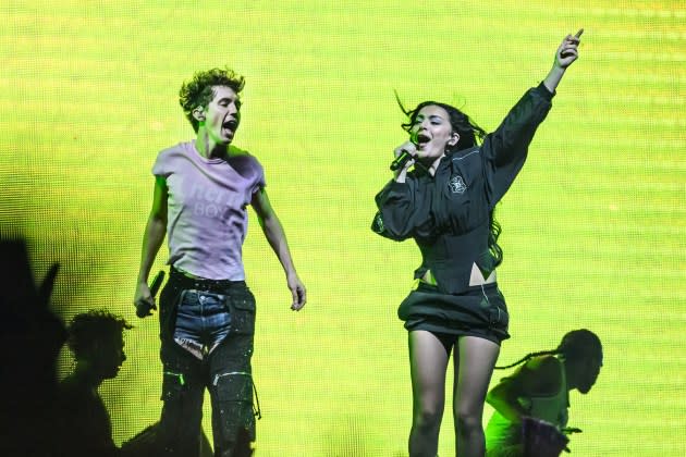 Charli XCX joins Troye Sivan on stage during the Something to Give Each Other Tour on June 27, 2024. - Credit: Katja Ogrin/Redferns/Getty Images