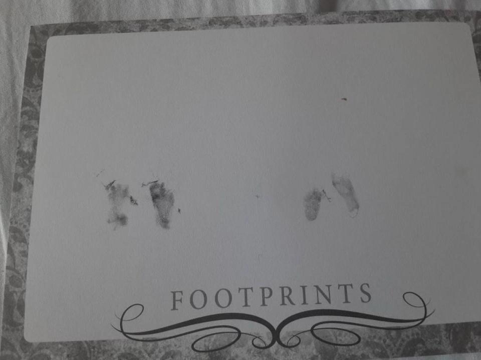 Lauren Kent received stamps of her child’s footprints after she gave birth to her stillborn baby, Dakota Lee, at Collin County Jail.