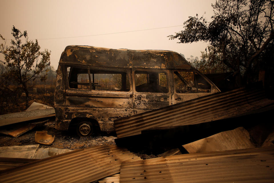 A burned-out vehicle&nbsp;was left behind&nbsp;by a forest fire near Vale do Couco, Portugal, on Oct. 16, 2017. (Photo: Pedro Nunes / Reuters)