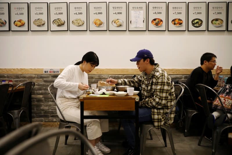 The Wider Image: No money, no hope: S. Korea's 'Dirt Spoons' turn against Moon