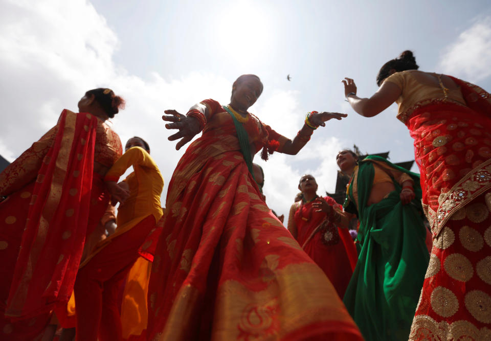 Women sing and dance during the Teej festival in Kathmandu