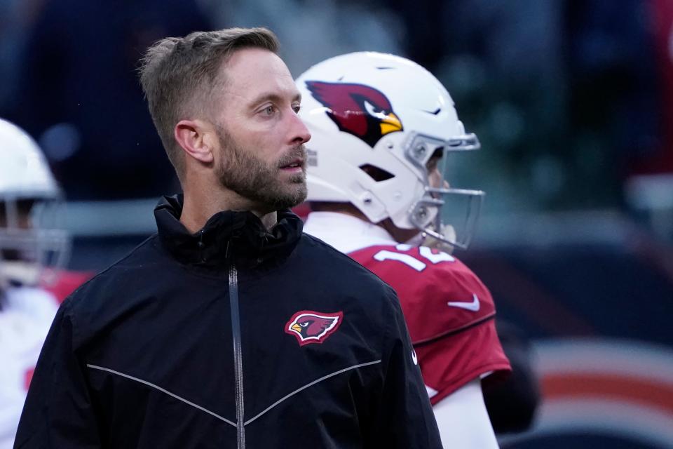 Arizona Cardinals head coach Kliff Kingsbury looks downfield as his team warms up before an NFL football game against the Chicago Bears Sunday, Dec. 5, 2021, in Chicago.