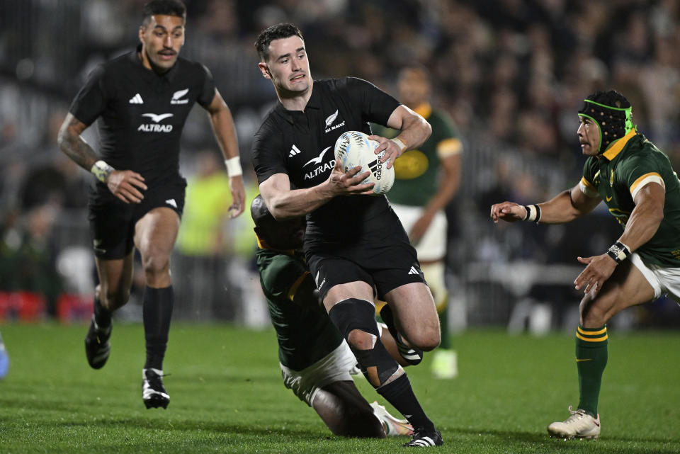 New Zealand's Will Jordan runs at the defence during the Rugby Championship test match between the All Blacks and South Africa at Mt Smart Stadium in Auckland, New Zealand, Saturday, July 15, 2023. ( Alan Lee/Photosport via AP)
