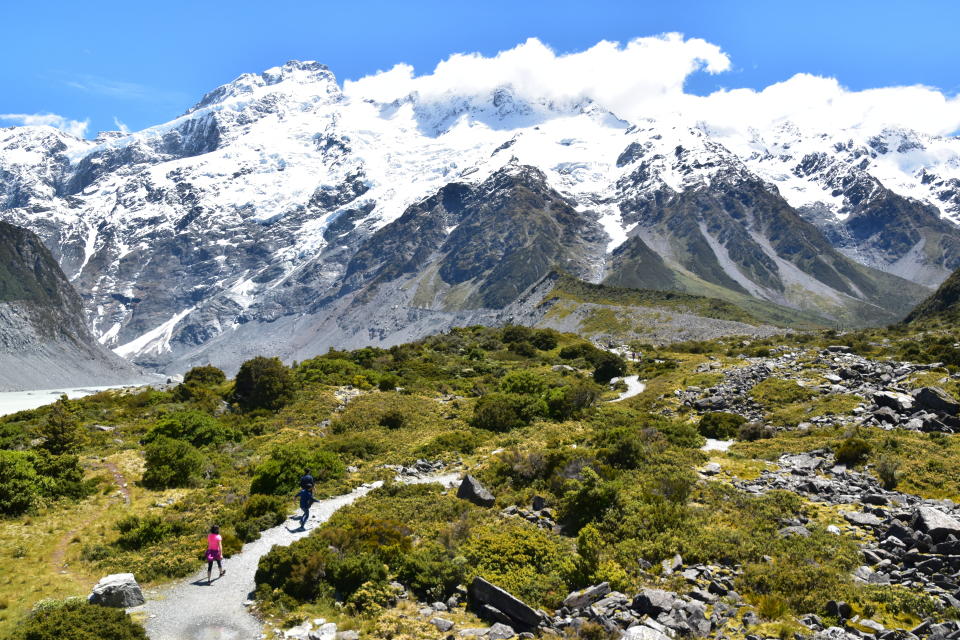 This Dec. 21, 2019, photo shows the Hooker Valley Track that leads to the base of the Hooker Glacier at the bottom of Mt. Cook, New Zealand’s tallest mountain, also known as “Cloud Piercer." (Malcolm Foster via AP)