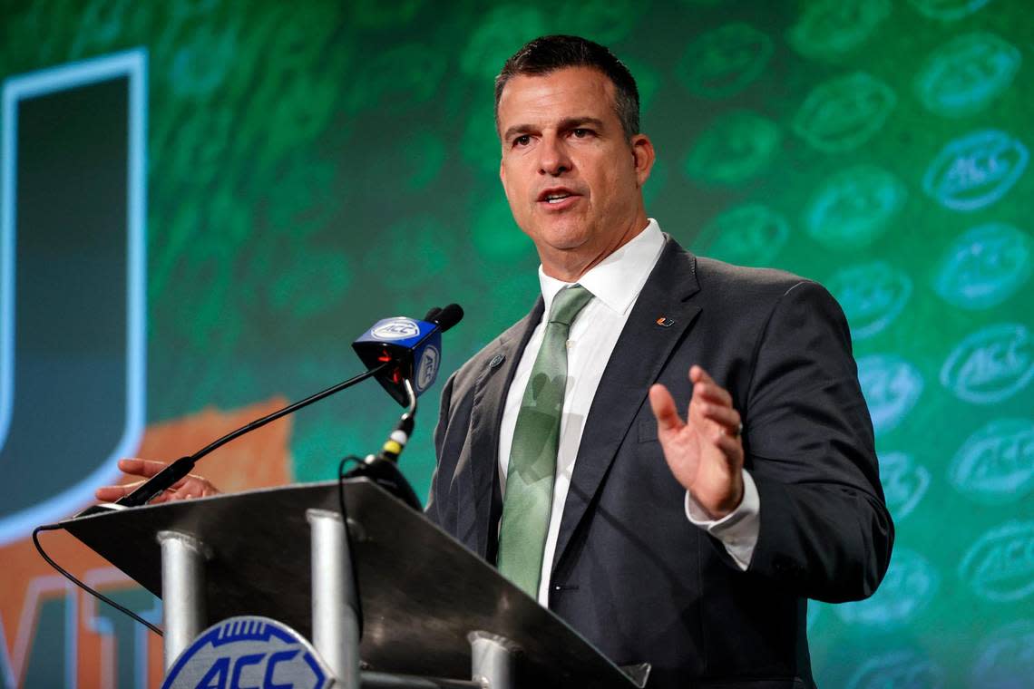 Miami head coach Mario Cristobal answers a question at the NCAA college football Atlantic Coast Conference Media Days in Charlotte, N.C., Thursday, July 21, 2022. (AP Photo/Nell Redmond)