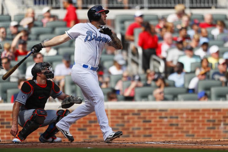 Atlanta Braves first baseman Matt Adams (18) hits a two run home run in the third inning of a baseball game against the Miami Marlins, Saturday, June 17, 2017, in Atlanta. (AP Photo/Todd Kirkland)