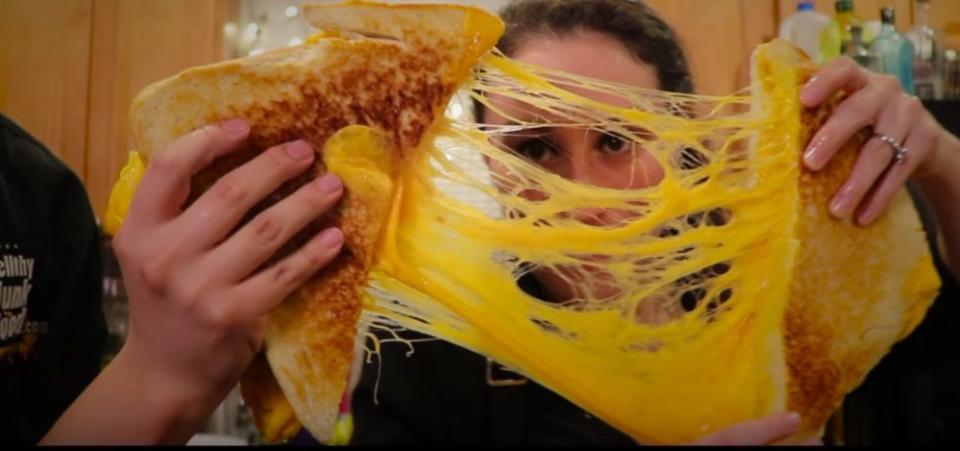 This viral video shows you how to make a gigantic grilled cheese sandwich because this is something you need to know