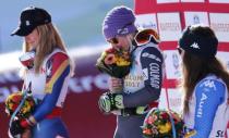 Alpine Skiing - FIS Alpine Skiing World Championships - Women's Giant Slalom - St. Moritz, Switzerland - 16/2/17 - Gold medalist Tessa Worley of France is flanked by silver medalist Mikaela Shiffrin (L) of the USA and Italy's bronze medal winner Sofia Goggia during the flower ceremony. REUTERS/Denis Balibouse