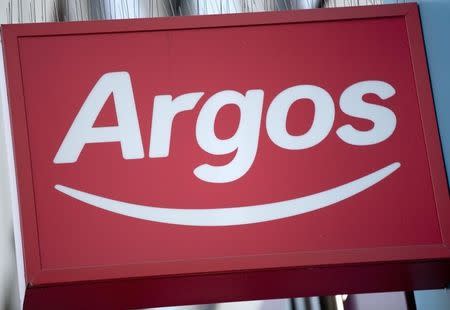An Argos sign is seen outside a store in London January 17, 2013. REUTERS/Neil Hall