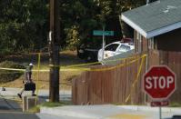 <p>A police investigator arrives near the scene where an officer was fatally shot and another was injured at a traffic stop late on Thursday, in San Diego, Calif., on July 29, 2016. (REUTERS/Mike Blake)</p>