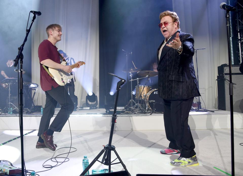 Sam Fender and Elton John perform at the 28th Annual Elton John AIDS Foundation Academy Awards Viewing Party. (Photo: Michael Kovac/Getty Images for EJAF)